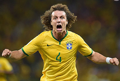 Pick that one out! Luiz celebrates after hitting an incredible free-kick past Colombia goalkeeper David Ospina