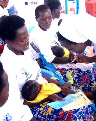 Vaccination has played a major role in the fight against childhood diseases. File