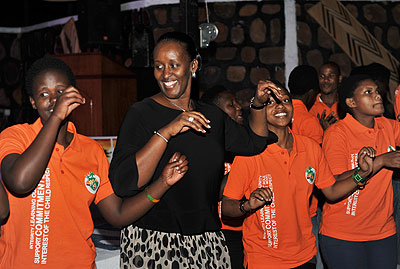 The First Lady joins Agahozo-Shalom Youth Village children in a traditional dance during the fundraiser on Thursday. Courtesy.  