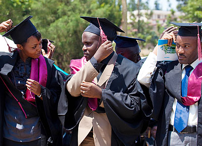 Graduates during a past graduation ceremony. There is a requirement that students need to carry out a research project to be awarded their degrees. File.