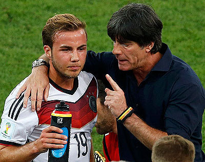Joachim Loew talks to Mario Goetze. Net photo