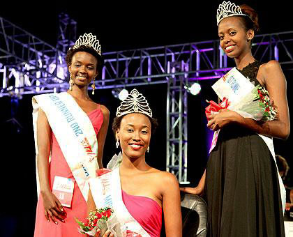 Akiwacu (centre) poses with first runner-up Carmen Akineza (R) and second runner-up Marlu00e8ne Umutoniwase (L) the night she was crowned in February this year. 