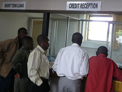 Clients seek services at a financial institution. It is easier for one to access a loan facility in micro-finance institutions than in commercial banks. File. 