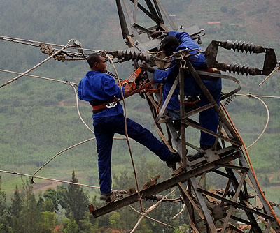 EWSA technicians fix a power line. The agency has been faulted for disrgarding AGu2019s past recommendations.  File.