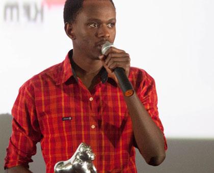 Emmy Mbabazi speaking at Century Cinema after being awarded. (Timothy Kisambira)
