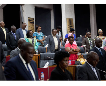 MPs observe a moment of silence in remembrance of the victims of the Kiziguro accident in Gatsibo District yesterday. T. Kisambira.