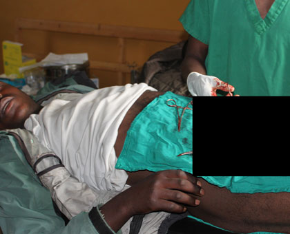 A youth undergoes circumcision. A study shows that circumcision reduces the risk of contracting HIV by 60 per cent. (File)  