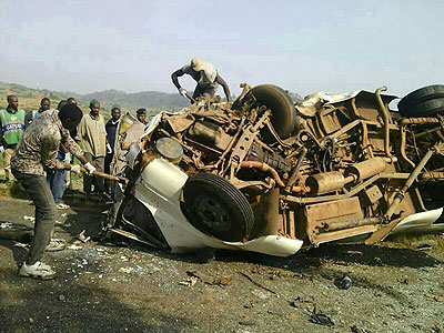 Rescuers retrieve victims from the wreckage  following the fatal road accident in Gastibo on Tuesday. Net.