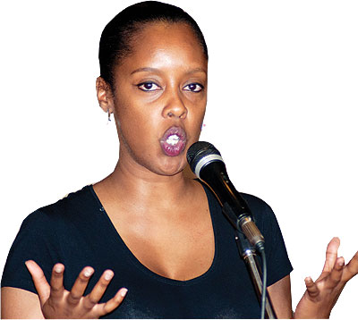  Spoken Word co-founder, Diana Mpyisi, adresses the crowd