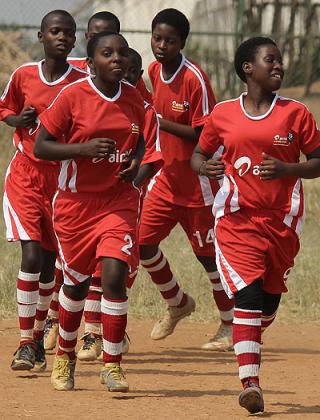 AS Kigali Academy girlsu2019 team warming up before a previous game in the ongoing Airtel Raising Stars' competition. Courtesy.
