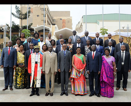 President Paul Kagame in a group photo with members of the new cabinet soon after the swearing in ceremony at Parliamentary Building in Kimihurura yesterday. Village Urugwiro.  