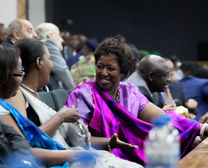 Health minister Agnes Binagwaho(centre), shares a light moment with East African Community Affairs new minister Amb. Valentine Rugwabiza at the swearing in ceremony of Cabinet yesterday.  Timothy Kisambira. 