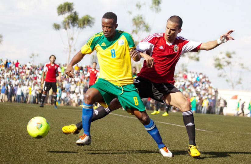 Amavubi captain Haruna Niyonzima, seen here in action against Libya in the previous Afcon qualifying round, is confident of upsetting Congo on August 2. (Timothy Kisambira)