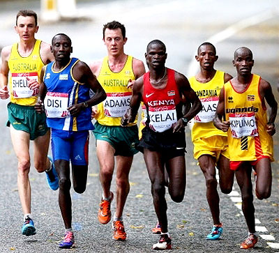 Michael Shelley of Australia, Dieudonne Disi, Liam Adams of Australia, John Kelai of Kenya, Philip Kiplimo of Uganda compete in the Men's marathon yesterday. Shelley won the race, while Kenyau2019s Stephen Chemlany and Ugandau2019s Kiplimo came in second and third, respectively.  Net photo.