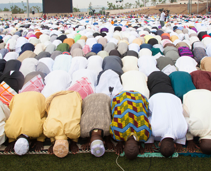 Hundreds of Muslims celebrated the end of the holy month of Ramadan at  Kigali Regional Stadium in Nyamirambo. (Timothy Kisambira) 