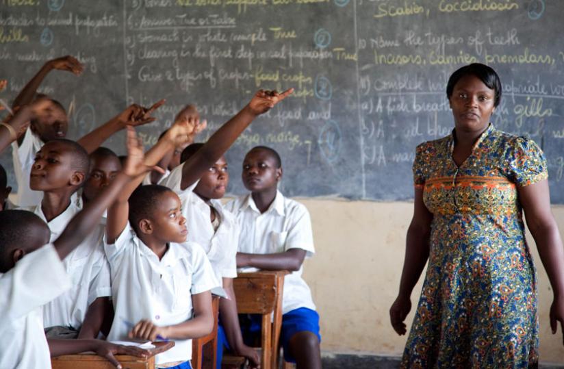A teacher conducts a lesson at Kimisagara Primary School in the recent past. (File)