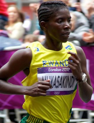 Claudette Mukasakindi seen taking part in London Olympic Games, is expected to compete in the 10000m women finals tonight. Courtesy