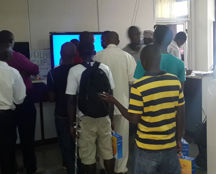 Last call: Customers lining up at Star Media to buy digital decoders. (File)