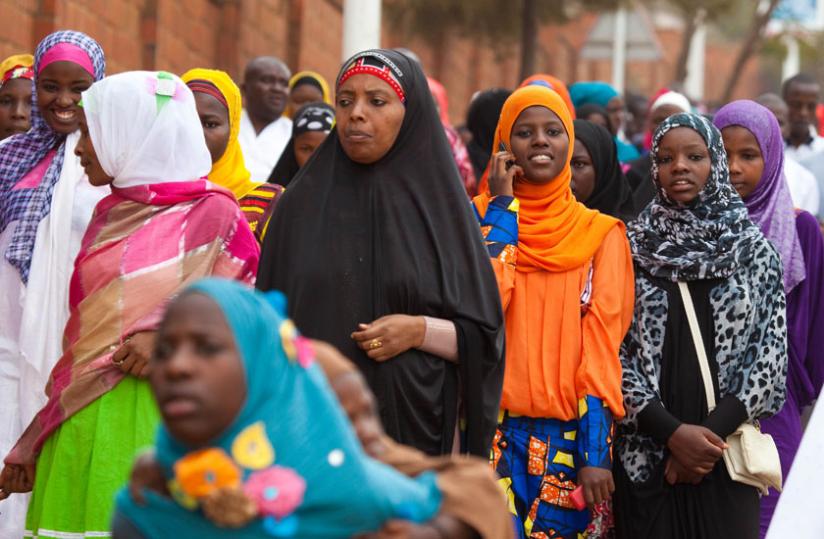 Female Muslims leaving Nyamirambo Stadium after Eid Prayer. (Timothy Kisambira)