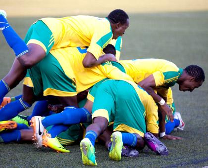 Amavubi players celebrate at the last whistle after beating Congo 4-3 on penalties following a 2-0 win in normal time. Congo had won the first leg 2-0 two weeks ago. The Team now q....