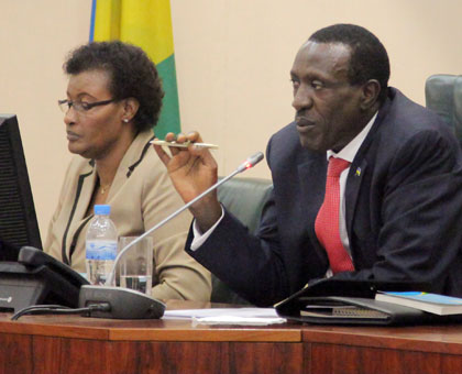 Senate president Jean Damascene Ntawukuliryayo (R), and  the Speaker of the Lower chamber Donatille Mukabalisa address journalists yesterday. (John Mbanda)
