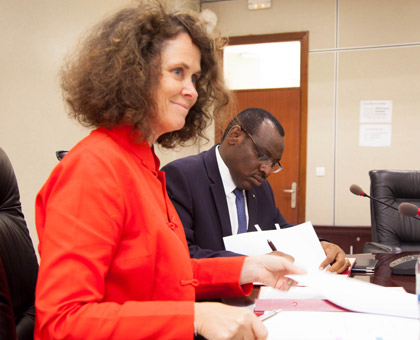 Minister Gatete (R) and Turk sign the SGBV financial agreement in Kigali yesterday. (Timothy Kisambira)