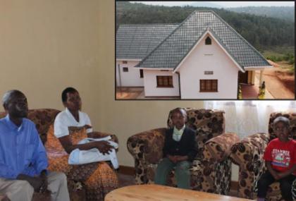 Ndayambaje, his wife and children in the living room. Inset is the Rwf40m house. (Jean-Pierre Bucyensenge)
