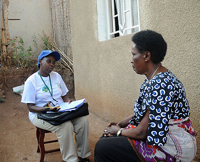 A census enumerator talks to a resident in Remera during the last national census. File. 