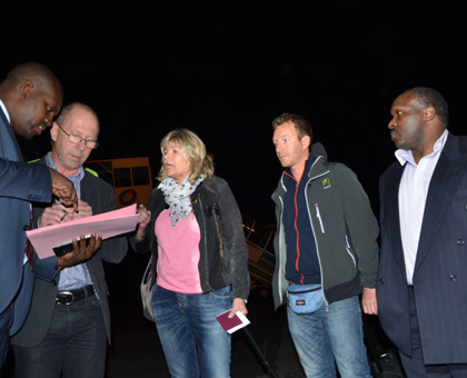 Mbarushimana (R) at Kigali International Airport upon his extradition last month. (File)