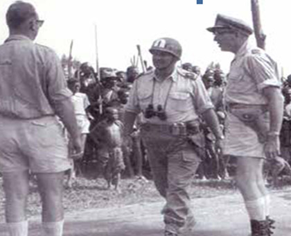 Belgian administrators persuading a gang of Parmehutu militiamen to calmly disperse, 1959. (Imvaho Nshya archives)
