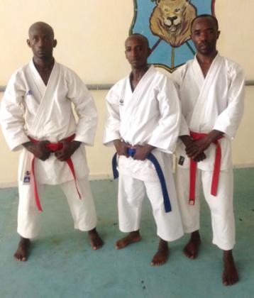 Rwandau2019s male Kata team that lost in the quarter-finals to Ivory Coast. (L-R) Jean Claude Kumi, Sylvestre Twajamahoro and Noel Nkuranyabahizi. Courtesy.