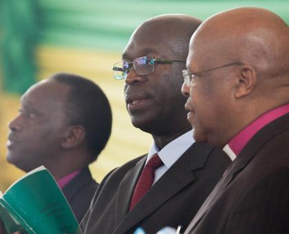 Rev Dr Andre Karamaga, head of all African conference of churches (R), Prime Minister Anastase Murekezi (C) and Bishop Alexis Bilindabagabo during the celebrations. (Timothy Kisambira)