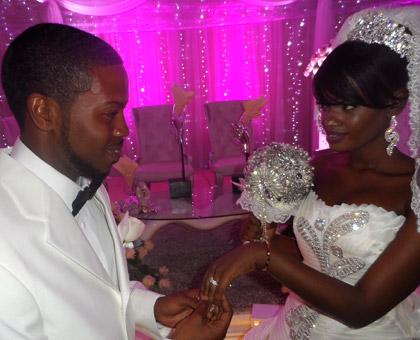 Jacques and Bianca exchange vows recently. They chose to wed in Rwanda so that their children would have a place they call home. (Moses Opobo)