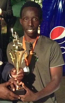 U19 team captain Don de Dieu Mugisha with his award for best bowler.