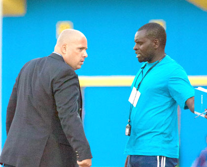 Rayon Sports coach Jean-Franu00e7ois Lusciuto (L) shares a word with his assistant Sosthu00e8ne Habimana during the group game against Azam. (Timothy Kisambira)