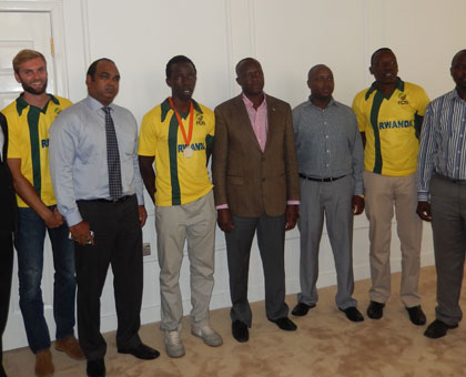 Minister Habineza (C) with the RCA delegation at the formeru2019s office at Amahoro Stadium, yesterday. (Pontian Kabeera)