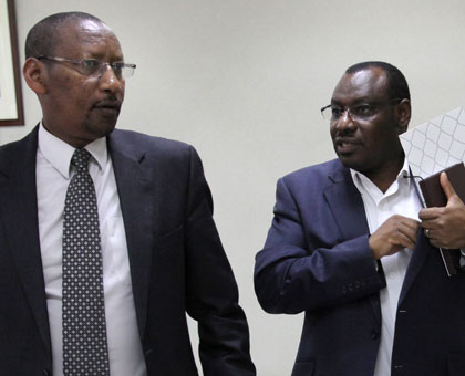 Rwagombwa (L) and Gatete after the briefing yesterday. (John Mbanda)