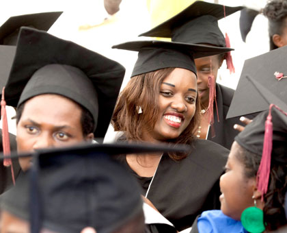 Female graduates celebrate after being confered upon yesterday. Timothy Kisambira. 