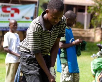 Aphrodis Nyilinkwaya is one the key players on Rwanda's national golf team. (Timothy Kisambira)