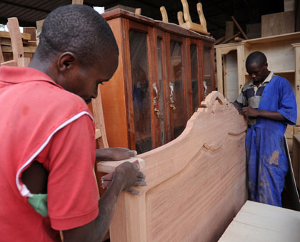Youths in a carpentry business at Gaculiro. BDF has pledged to facilitate rural communities with access to financial services. John Mbanda. 