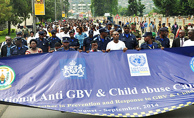 Police hold a banner at the launch of anti-GBV campaign in Musanze on Monday. Courtesy