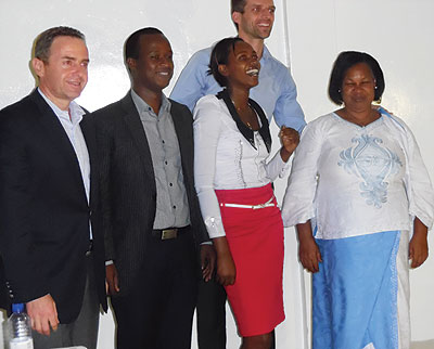 Umutoni (second right) poses with judges after the competition on Thursday. Emmanuel Ntirenganya.
