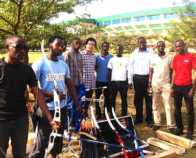 Axiom Network group offcials pose with the Archery and Shooting federation after donating the sporting equipment. Courtesy