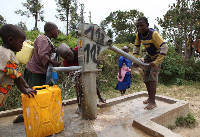 Children fetch water at a public borehole. Over 11% of city dwellers donu00e2u20acu2122t have access to safe water. (File)