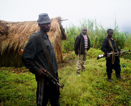 Some of the FDLR militiamen guard their base in DR Congo. (File)