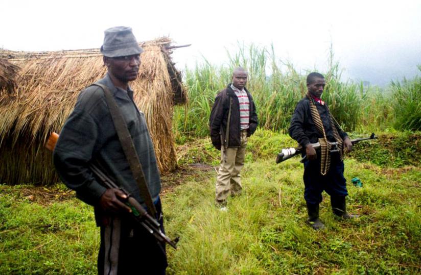 Some of the FDLR militiamen guard their base in DR Congo. (File)
