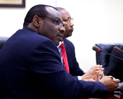 Finance minister Claver Gatete (L), together with central bank Governor John Rwangombwa, brief the media on the Treasury bond subscription in Kigali yesterday. (Timothy Kisambira)