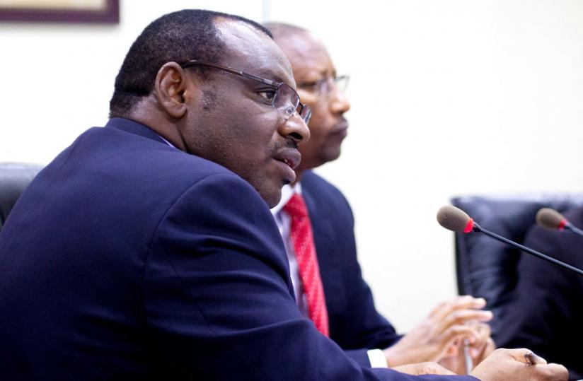 Finance minister Claver Gatete (L), together with central bank Governor John Rwangombwa, brief the media on the Treasury bond subscription in Kigali yesterday. (Timothy Kisambira)