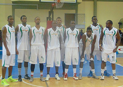 Espoir basketball club players pose for the camera before yesterday's classification game against Coop. Bank. Courtesy photo