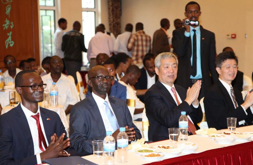 Amb. Shen Yongxiang (2nd right) during the cocktail at the Embassy Hall in Kigali on Thursday. (Courtesy)rn